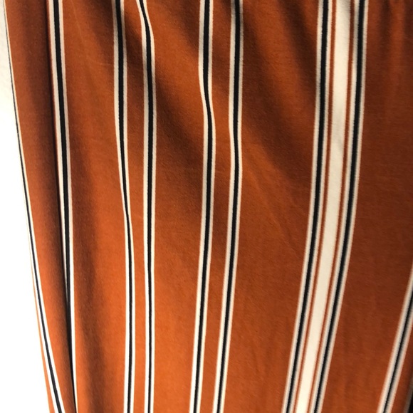 orange black and white boot cut pants - Picture 2 of 2